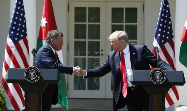 Image: U.S. President Trump greets Jordan's King Abdullah II during joint news conference at the White House in Washington