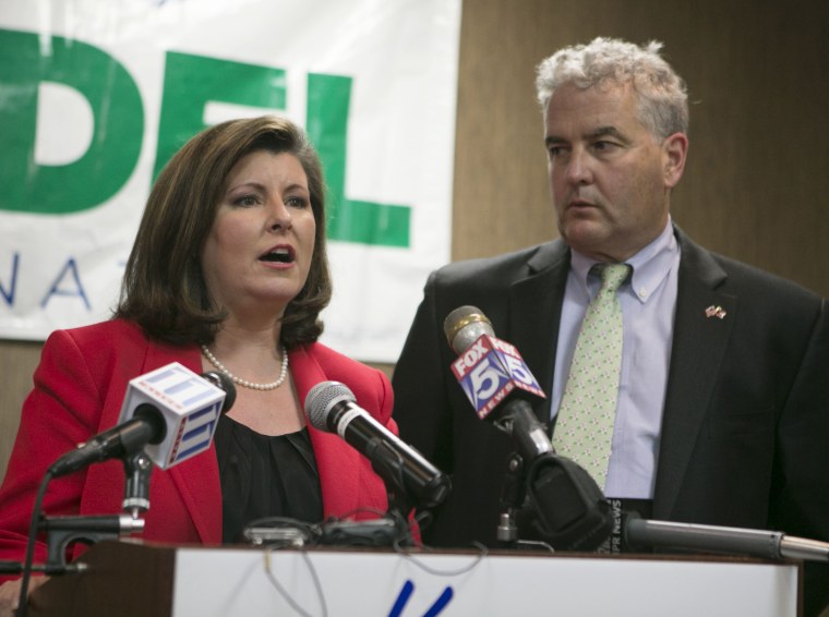 Image: Republican candidate for U.S. Sen. Karen Handel concedes her race with her husband Steve beside her