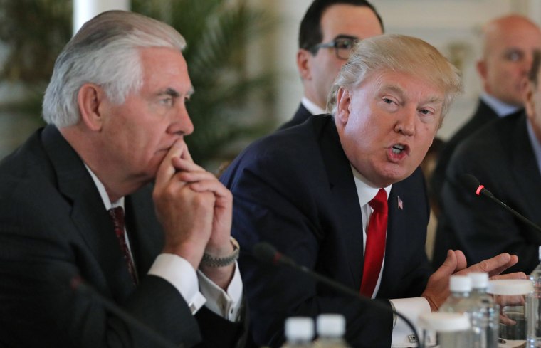 Image: U.S. President Trump speaks next to Tillerson during bilateral meeting with China's President Xi at Trump's Mar-a-Lago estate in Palm Beach