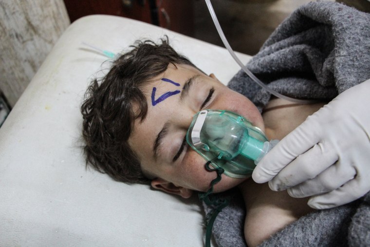 Image: At least 58 killed in suspected gas attack in northern Syria, NGO