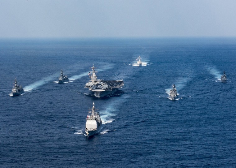Image: U.S. Navy aircraft carrier USS Carl Vinson, the guided-missile destroyer USS Wayne E. Meyer and the guided-missile cruiser USS Lake Champlain