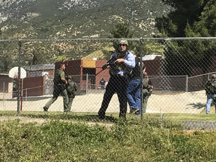 Image: Emergency personnel respond to a shooting inside North Park School Elementary School