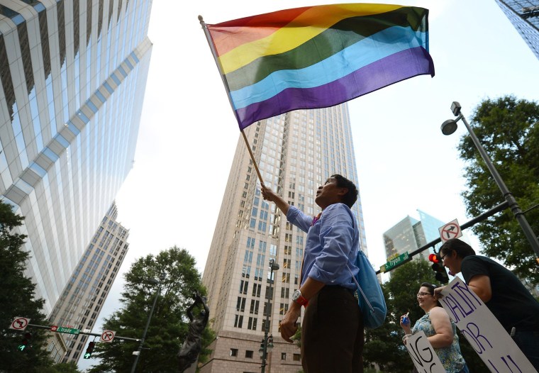 Image: Marchers celebrate after the Supreme Court struck down the Defense of Marriage Act