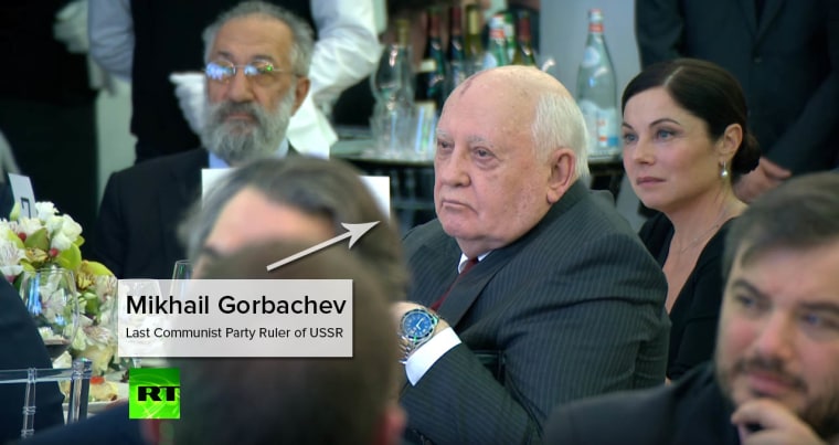 Mikhail Gorbachev sat a table behind Putin's.