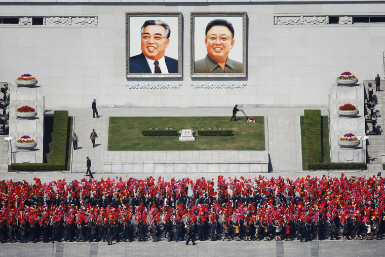 Image: People practice for the expected parade on the main Kim Il-Sung Square in central Pyongyang