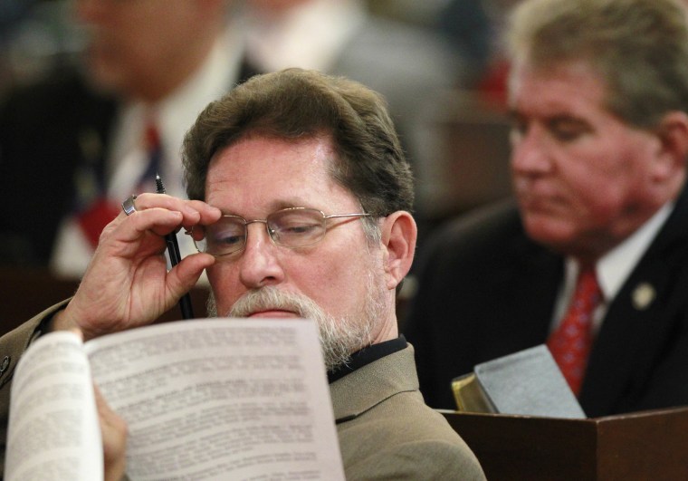 Image: Larry Pittman attends a House session