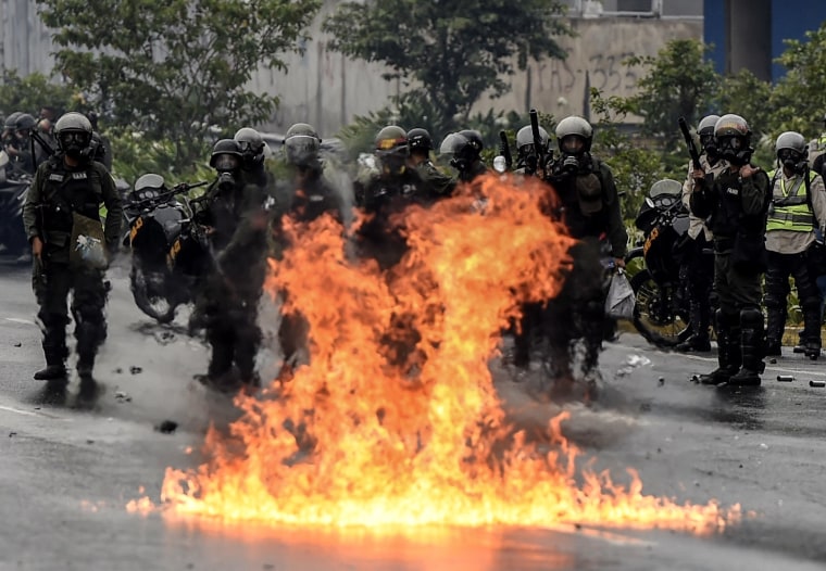 Image: TOPSHOT-VENEZUELA-CRISIS-OPPOSITION-PROTEST