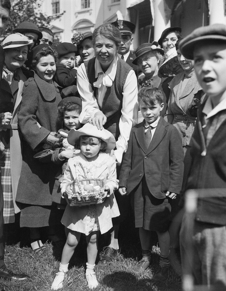 Image: Eleanor Roosevelt greets 3-year-old Jean Doering of Washington at the start of the annual Easter egg roll