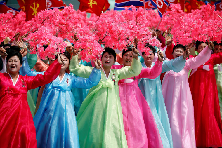 Image: Women wearing traditional clothes in Saturday's parade.ng