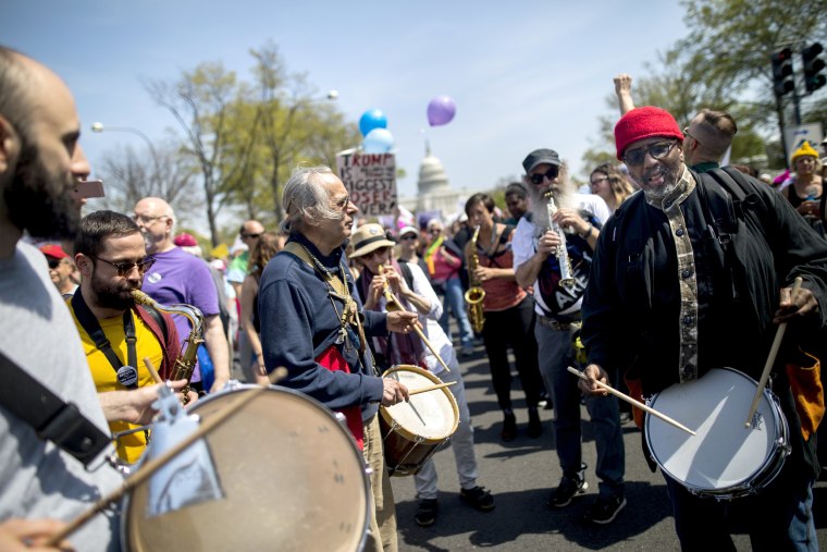 Image: Protesters play music while demanding Trump release his tax returns, outside the Capitol building in Washington, DC.