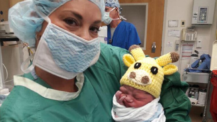 Baby Jeriel in his April the giraffe hat