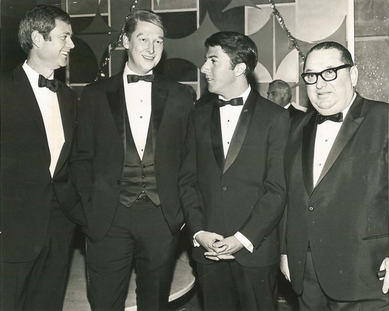 In order from left to right: Larry, Mike Nichols, Dustin Hoffman, and Joseph Levine.