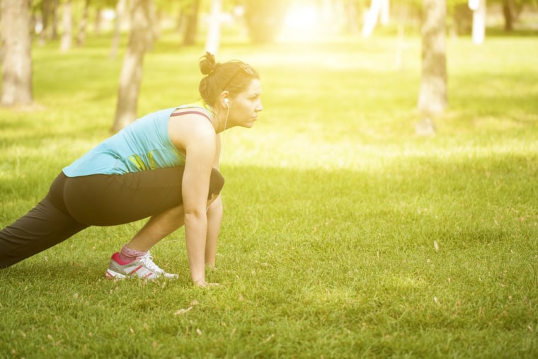 Image: Woman working out in the park