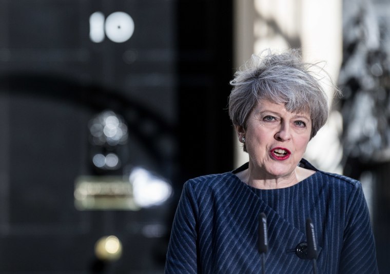 Image: Theresa May makes the surprise announcement outside 10 Downing Street, central London.