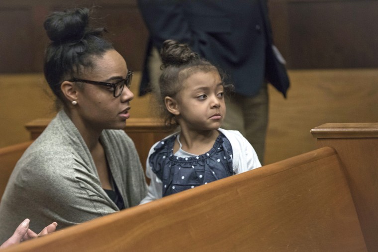 Image: Shayanna Jenkins Hernandez sits in the courtroom with the couple's daughter during jury deliberations