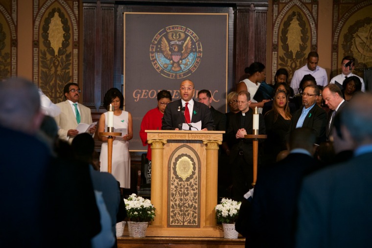 Mr. Jeremy Alexander, a descendant of the Mahoney family line and Georgetown staff member in the Office of Technology Commercialization, offers an intercession for hope at a Liturgy of Remembrance, Contrition, and Hope at Georgetown University.