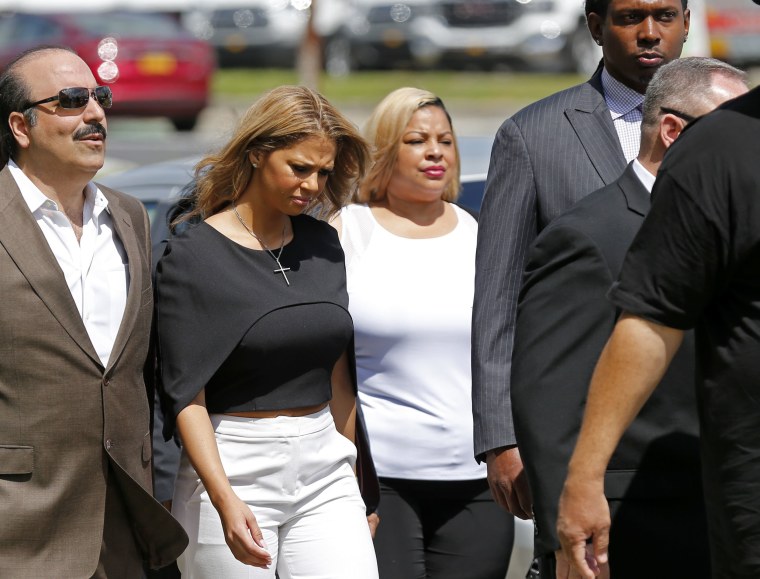 Image: Racquel Smith, widow of former New Orleans Saints star Will Smith, arrives at the Orleans Parish criminal courthouse
