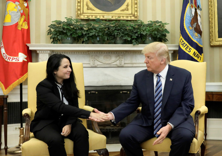 Image: Aya Hijazi, an Egyptian-American woman detained in Egypt for nearly three years on human trafficking charges, shakes hands with U.S. President Donald Trump in the Oval Office of the White House in Washington, April 21, 2017.