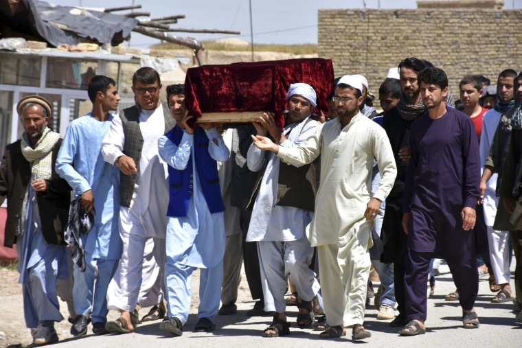 Image: Men carry the coffin of one of the victims after Friday's attack at a military compound in Mazar-e-Sharif province north of Kabul, Afghanistan, April 22, 2017.