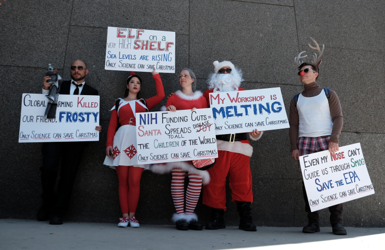 Image: Demonstrators use Christmas to illustrate the importance of science in Los Angeles, California.