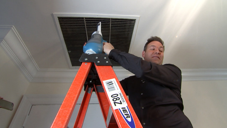 Jeff Rossen vaccums dust off his air vent.