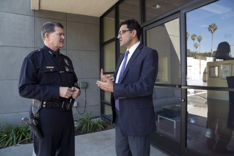 Image: Deputy Chief Michael Downing of the Los Angeles Police Department with Salam al-Marayati, director of the Muslim Public Affairs Council