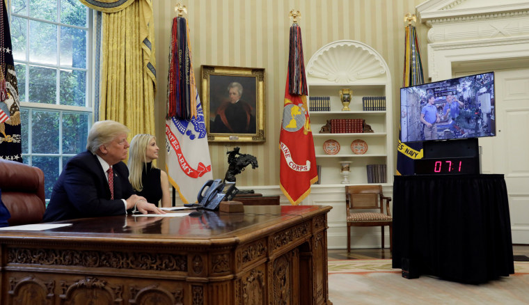 Image: Trump speaks to astronauts from the White House in Washington