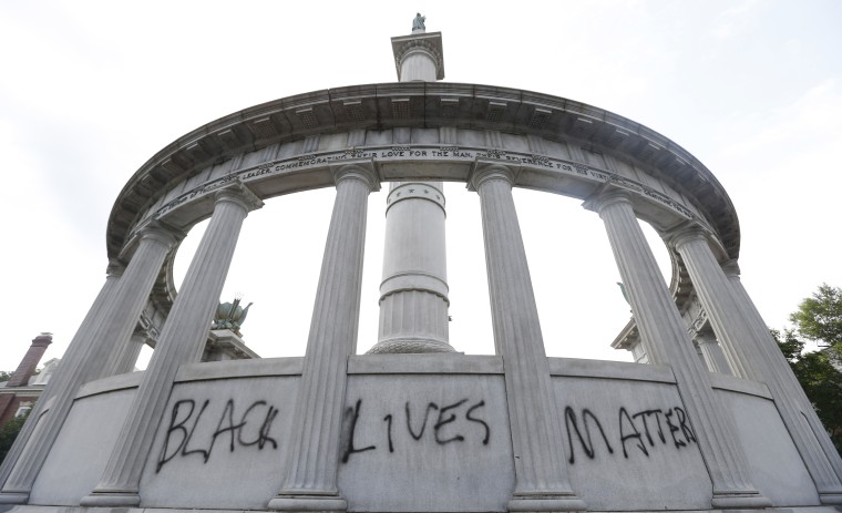 The words "Black Lives Matter" spray painted on a monument to former Confederate President Jefferson Davis in Richmond, Va. June 25, 2015.