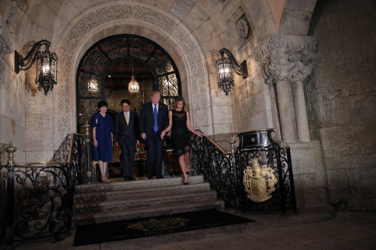 Image: U.S. President Donald Trump, First Lady Melania Trump (R), Japanese Prime Minister Shinzo Abe and his wife Akie Abe (L) pose for a photograph before attending dinner at Mar-a-Lago Club in Palm Beach, Florida, U.S.