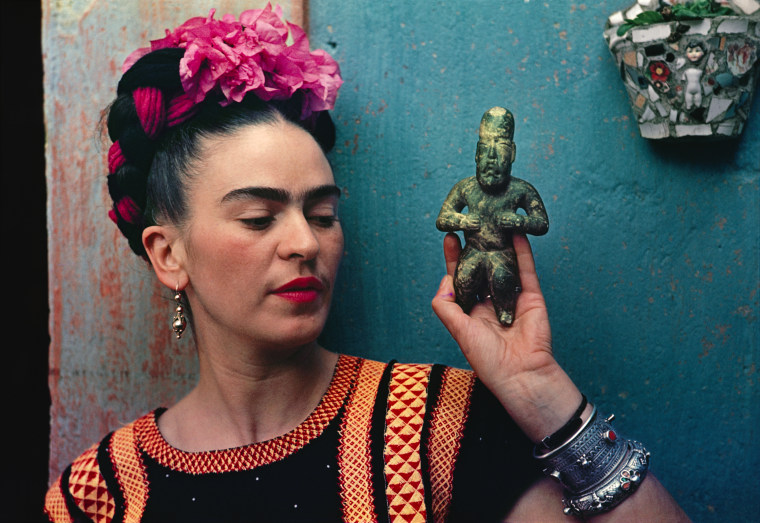 Through the Len of Nickolas Muray, Frida with Olmeca Figurine, Coyoacan, 1939