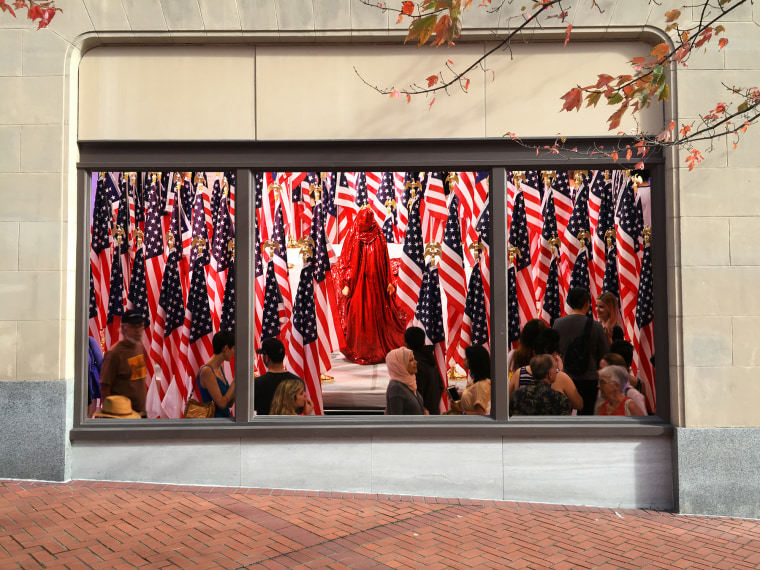 A window mural featuring pictures from the DC showing of "Red Chador."