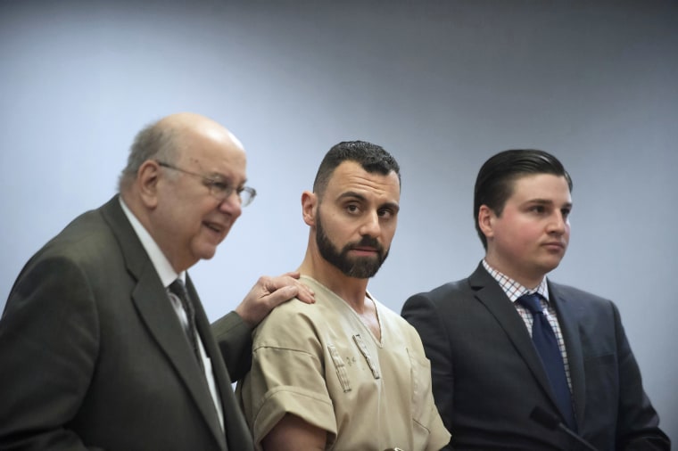 Image: Richard Dabate, center, appears with attorneys Hubie Santos, left, and Trent LaLima, right, while being arraigned