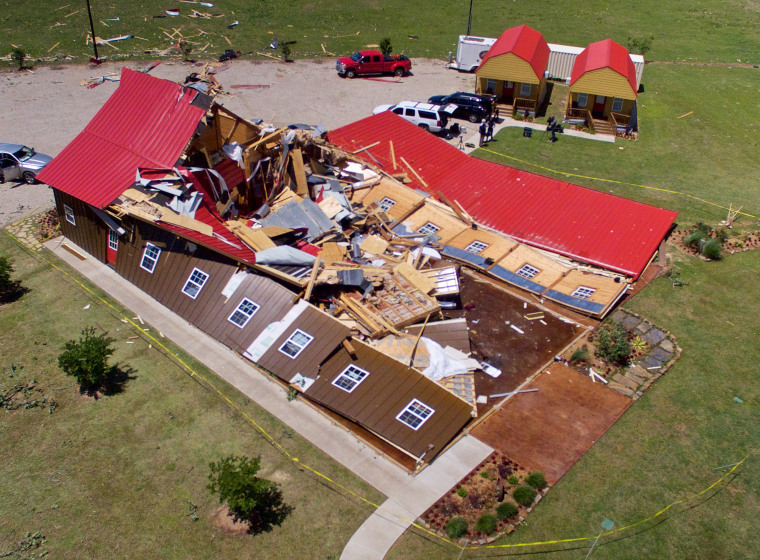 Image: The Rustic Barn, an event hall, which suffered major tornado damage, is seen from an unmanned aerial vehicle in Canton, Texas