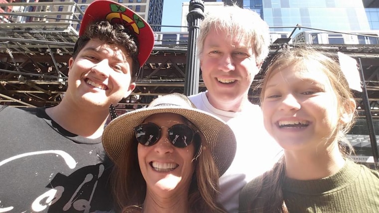 The Gertz family under an elevated train on college visits.