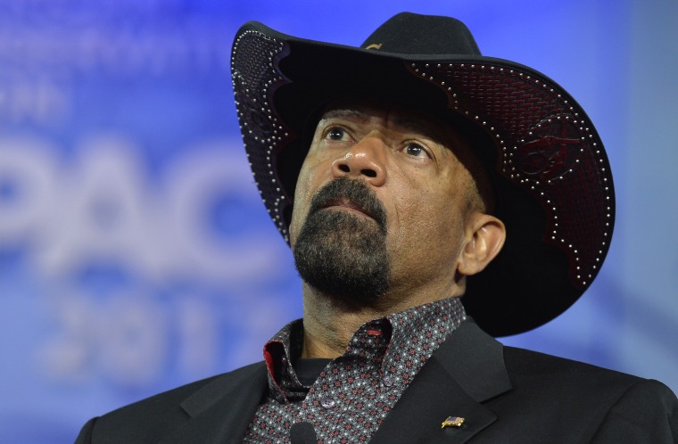 Image; Milwaukee County Sheriff David A. Clarke, Jr. listens to remarks during the Conservative Political Action Conference (CPAC) at National Harbor, Maryland, Feb. 23, 2017.