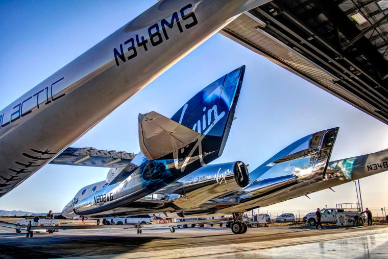 Virgin Galactic's spaceship Unity and its carrier plane the VMS Eve are seen during preparations for a test flight on May 1, 2017 based out of the Mojave Air and Space Port in California.