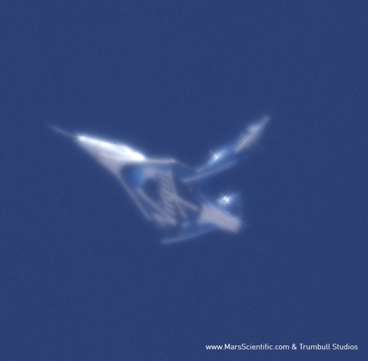 Virgin Galactic's second SpaceShipTwo space plane, the VSS Unity, tests its unique feather re-entry system during a May 1, 2017 glide test flight over the Mojave Desert in California.