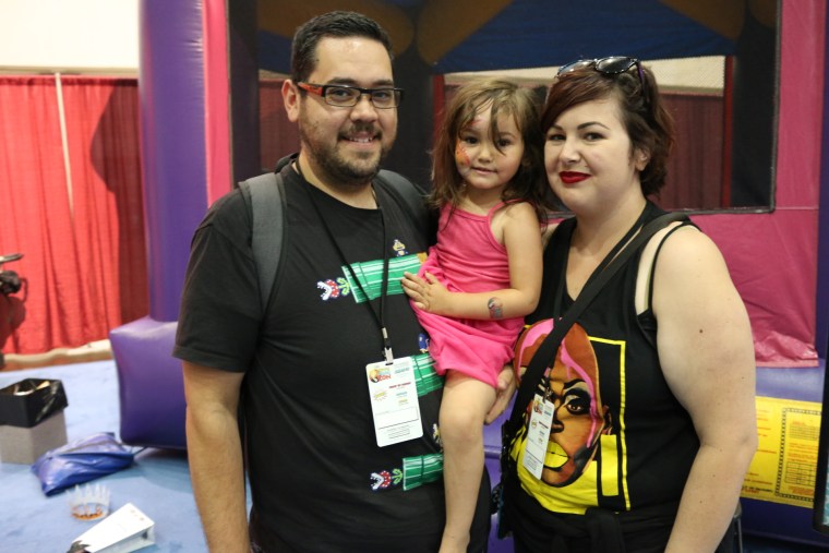 John and Marissa with their daughter at RuPaul's DragCon in Los Angeles