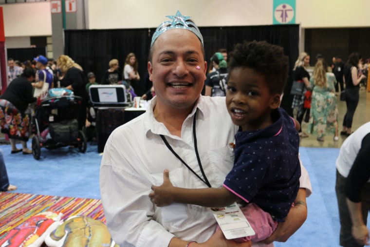 Michael Gonzalez and his son at RuPaul's DragCon in Los Angeles