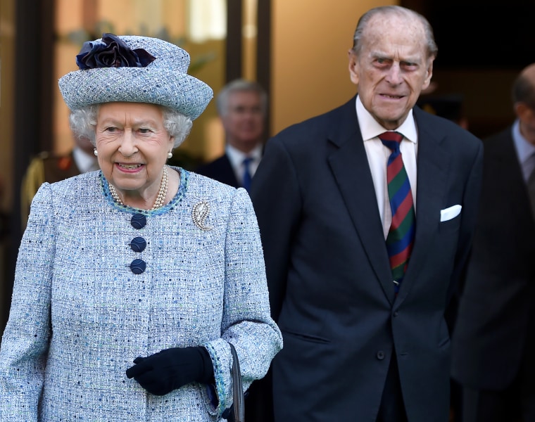 Image: Britain's Queen Elizabeth II and Prince Philip, the Duke of Edinburgh leave the National Army Museum in London