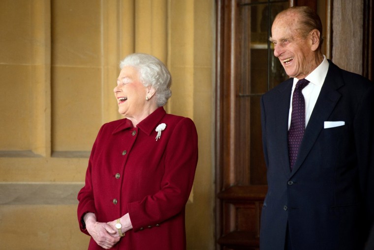 Image: FILE PHOTO: Britain's Queen Elizabeth and Prince Philip laugh after bidding farewell to the President of Ireland Michael D. Higgins and his wife Sabina at Windsor Castle in Windsor