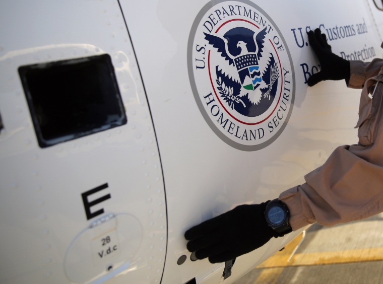 Image: A U.S. Department of Homeland Security - Immigration and Customs Enforcement helicopter.