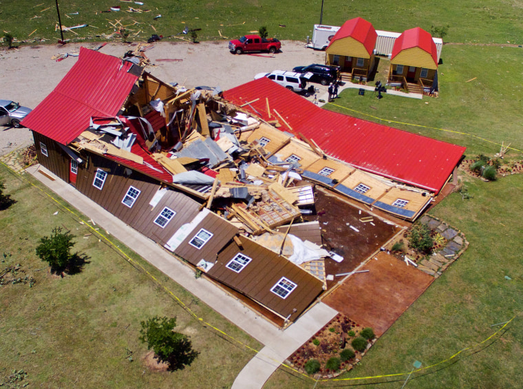 Image: The Rustic Barn, an event hall, which suffered major tornado damage, is seen from an unmanned aerial vehicle in Canton, Texas