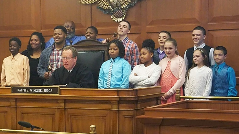 family adopts six siblings