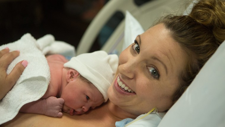 Jennifer Pope was photographed doing lesson plans for her second-grade class from her hospital bed, an hour before she gave birth.