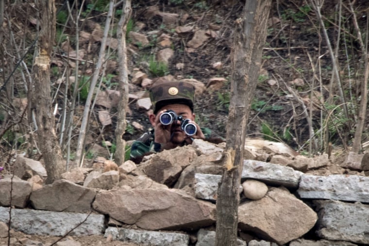 Image: A North Korean soldier near the Yalu River