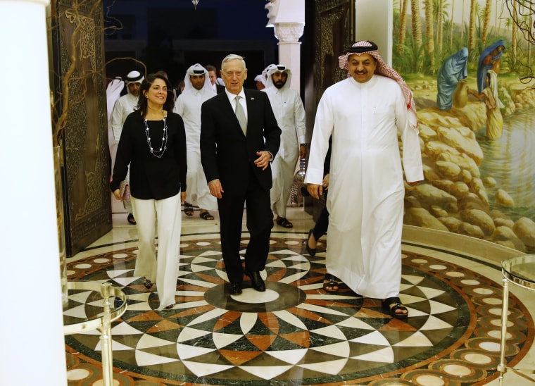 Image: Qatar's Minister of Defense Khalid bin Mohammad Al-Attiyah with Defense Secretary James Mattis and Ambassador to Qatar Dana Shell Smith