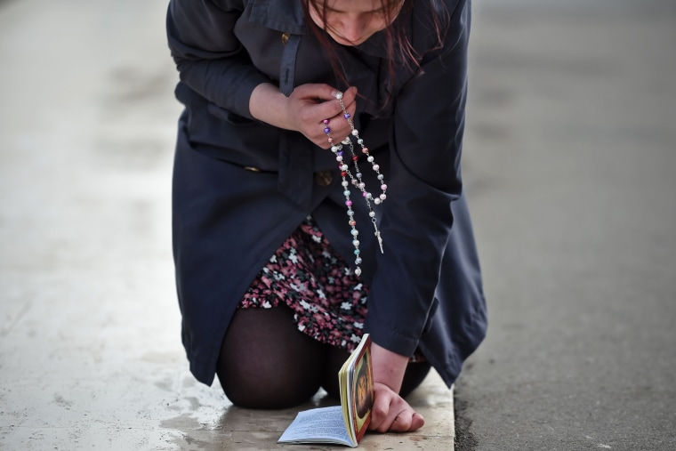 Image: A pilgrim in Fatima