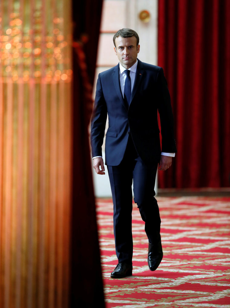 Image: French President Emmanuel Macron arrives to deliver a speech during his inauguration at the handover ceremony at the Elysee Palace in Paris