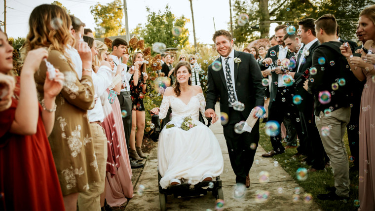 Quadriplegic bride weds her high school sweetheart